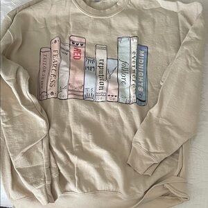Tan Eras Tour Book Themed Graphic Sweater